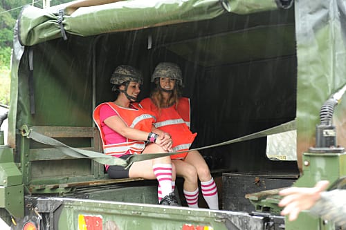 Claire and Brook Sit in a Humvee