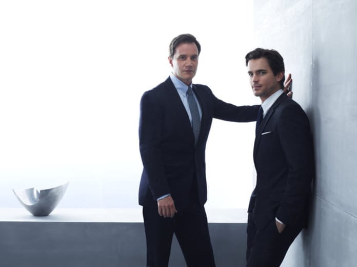 Matt Bomer as Neal Caffrey, Tim DeKay as Peter Burke -- News Photo