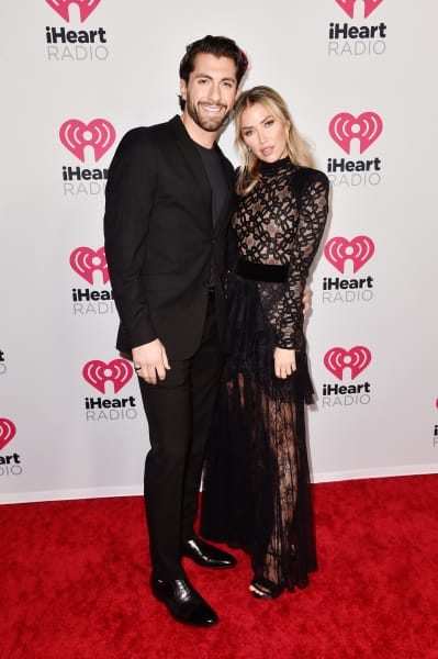 Jason Tartick and Kaitlyn Bristowe attend the 2020 iHeartRadio Podcast Awards