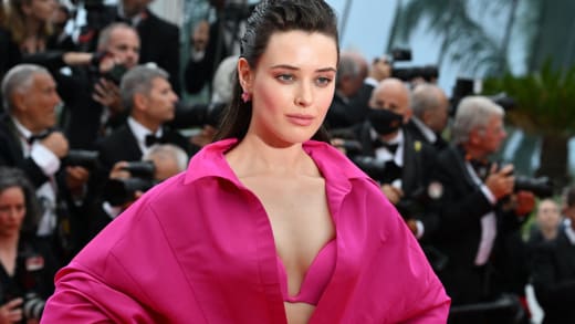 Katherine Langford poses as she arrives for the screening of the film "Top Gun : Maverick" during the 75th edition of the Cannes Film Festival 