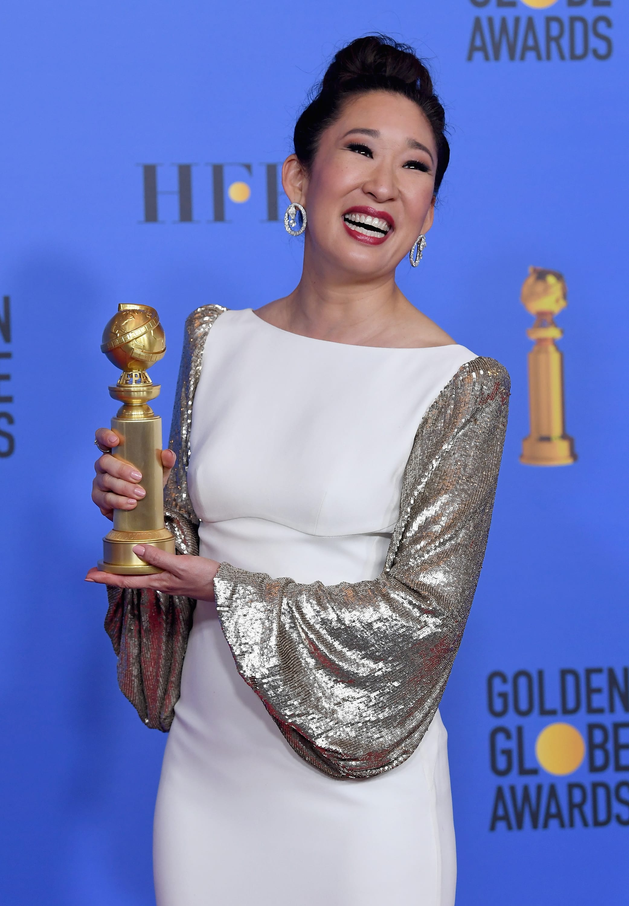 Sandra Oh Flaunts Her Golden Globe TV Fanatic