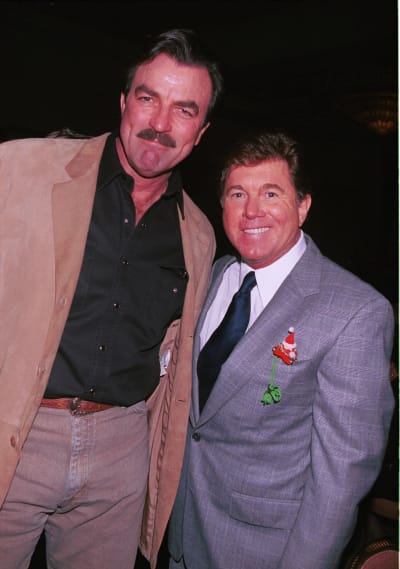 Actor Tom Selleck poses with his "Magnum P.I." television show co-star, Larry Manett