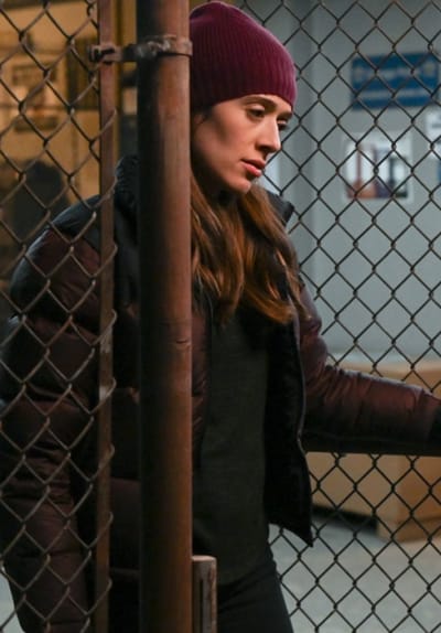 Leaning at the Cage - tall - Chicago PD Season 11 Episode 2