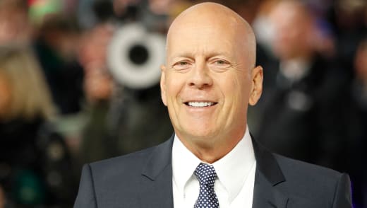 US actor Bruce Willis poses on arrival for the European premiere of Glass in central London