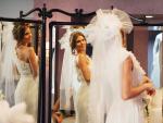 Admiring Her Gown