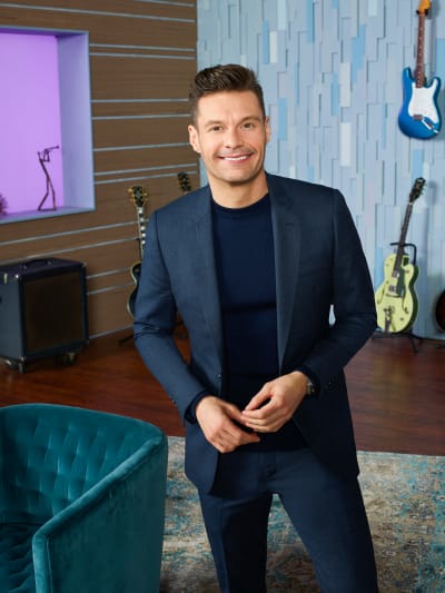 Ryan Seacrest Poses - American Idol