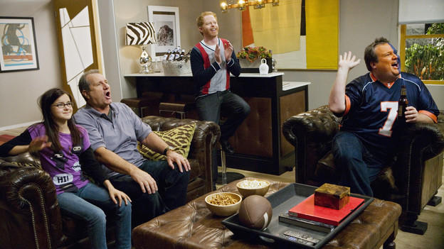 The Modern Family Watches Football