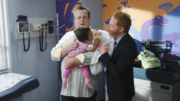 Mitchell and Cameron Hold Lily