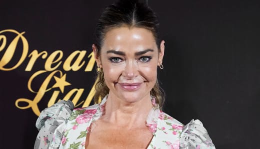  Denise Richards attends "Glow & Darkness" photocall