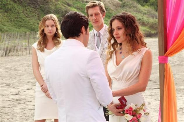 Emily Looks on at Wedding