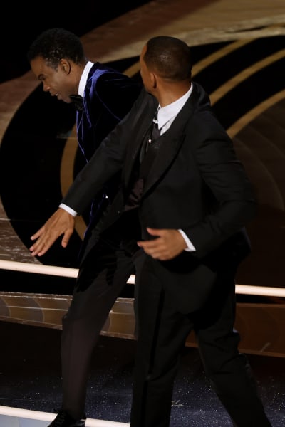 Will Smith appears to slap Chris Rock