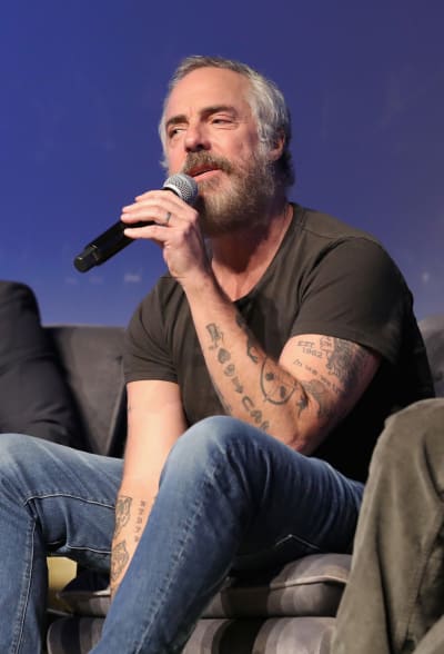 Actor Titus Welliver speaks onstage at the 