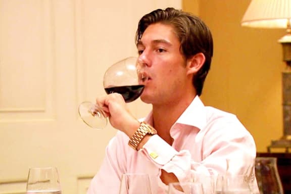 Thomas Drinks Wine