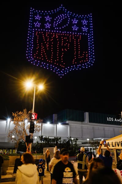 The National Football League (NFL) logo is seen over the Los Angeles Convention Center as the NFL conducts its first-ever Super Bowl Drone Show ahead of Super Bowl LVI,