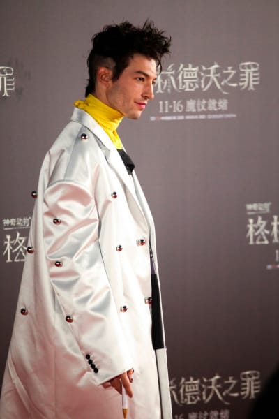 Actor Ezra Miller poses for a photo on the red carpet during a promotional event of the movie 'Fantastic Beasts: The Crimes of Grindelwald' i