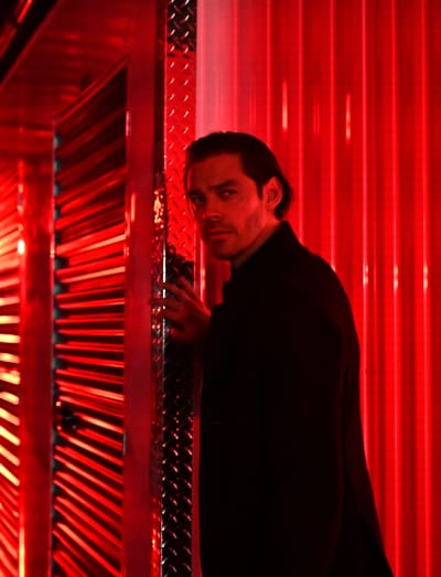 Malcolm in Red Glow - tall - Prodigal Son Season 2 Episode 12