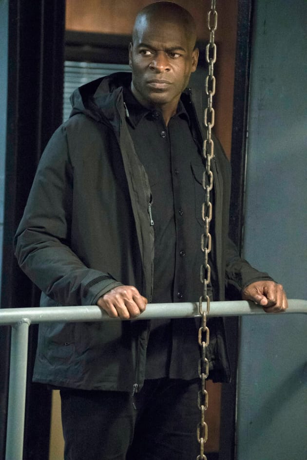 Dembe pauses to check out the area - The Blacklist Season 4 Episode 14