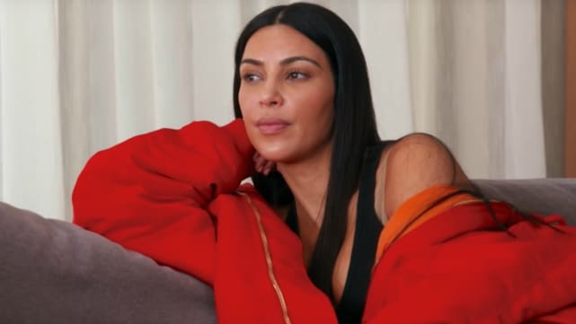 Kim in red keeping up with the kardashians