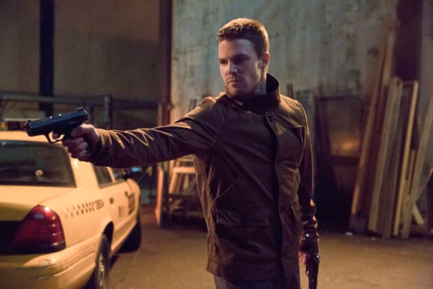 Oliver Aims a Gun