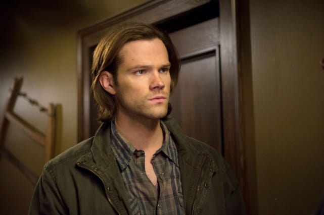 Sam in the Motel Hallway
