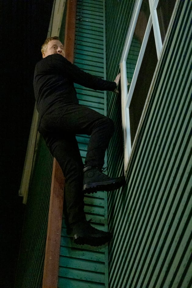 Climbing Out of the Window Resident Alien Season 3 Episode 2