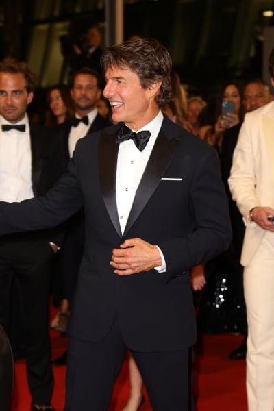 Tom Cruise leaves the screening of "Top Gun: Maverick" during the 75th annual Cannes film festival 