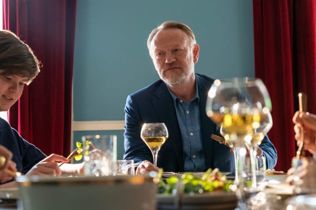 jared harris as george rattery at the table
