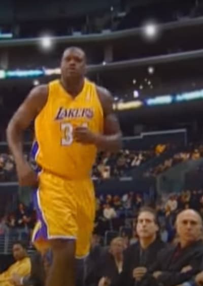 Shaquille O'Neal, tripping over Larry 