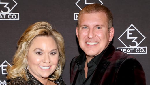 Julie Chrisley (L) and Todd Chrisley attend the grand opening of E3 Chophouse