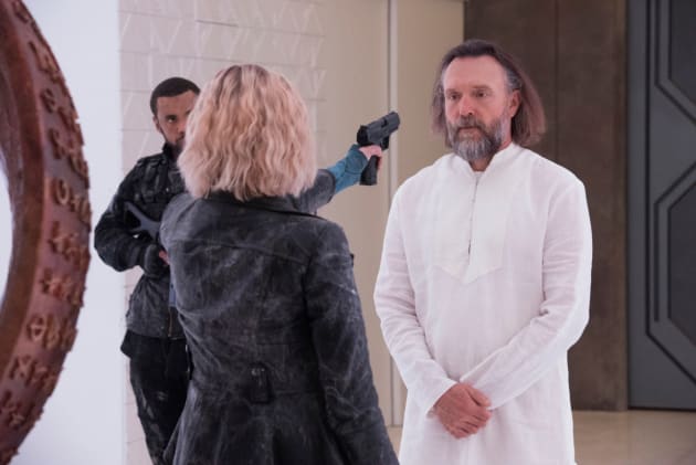 Cadogan with a gun pointed at him - The 100 Season 7 Episode 10