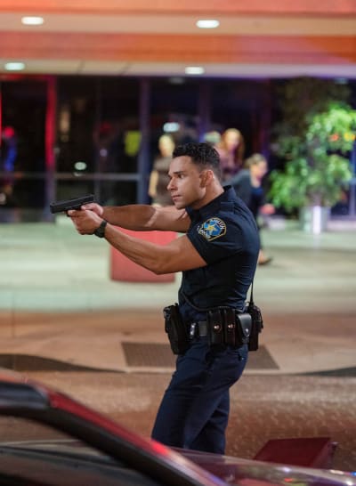 Officer Carlos Takes Aim - 9-1-1: Lone Star Season 1 Episode 2