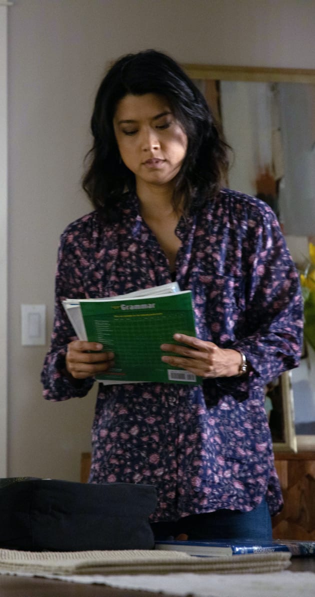Katherine holding Theo's work - A Million Little Things
