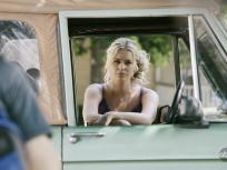 Roxie by her car