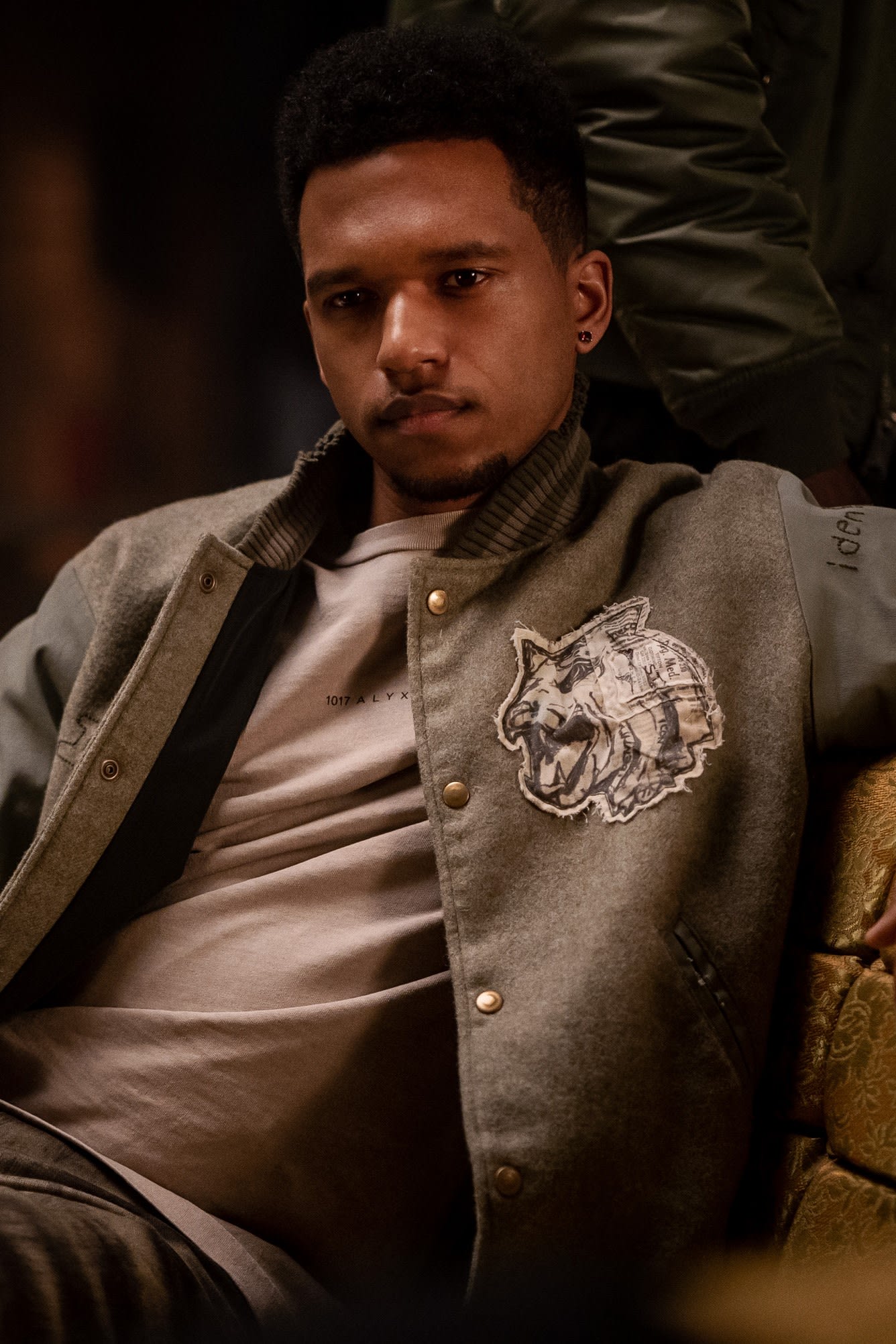 The down jacket without sleeve worn by Cane Tejada (Woody McClain) in the  series Power Book II: Ghost (Season 1 Episode 8)