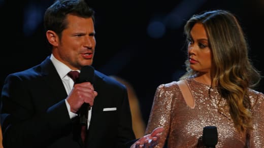 Hosts Nick Lachey and Vanessa Lachey talk during the 2018 Miss USA Competition at George's Pond at Hirsch Coliseum