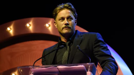 Travis Fimmel accepts the award for Actor of the Year during the GQ Men Of The Year Awards Ceremony 