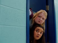 Lilly and Astrid Peering Around a Corner - Astrid & Lilly Save the World Season 1 Episode 3
