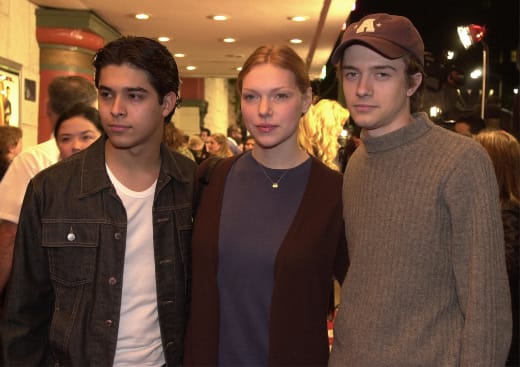 Actors Wilmer Valderrama, left, Laura Prepon, and Topher Grace