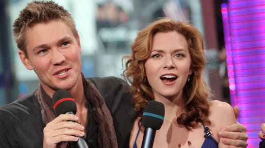 Chad Michael Murray and Hilarie Burton appear onstage during MTV's Total Request Live