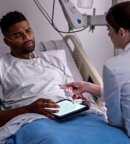 Bloom Bonds with a Patient - tall  - New Amsterdam Season 4 Episode 1