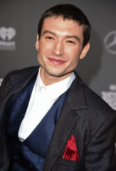 US actor Ezra Miller poses as he arrives for the world premiere of Warner Bros. Pictures film 'Justice League'