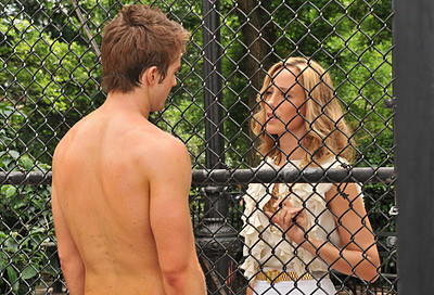 Nico and Kirby Behind a Fence