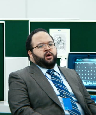 Dylan at his desk - Severance Season 1 Episode 4