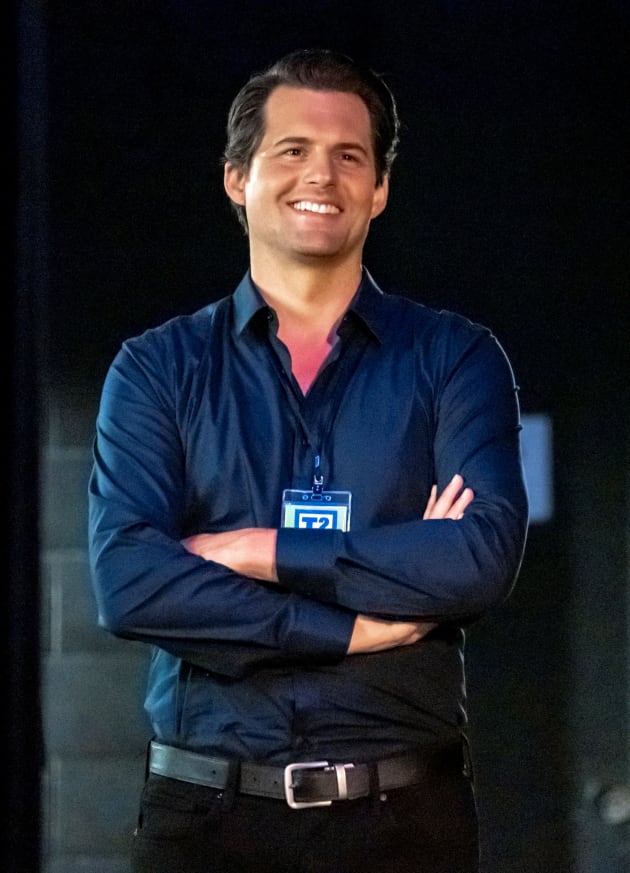 Travis Grins From the Wings