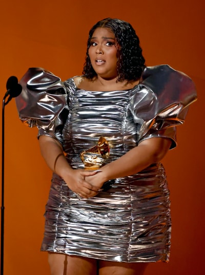 Lizzo accepts the Record Of The Year award for “About Damn Time”