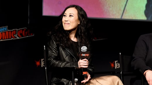 Angela Kang speaks onstage at NYCC