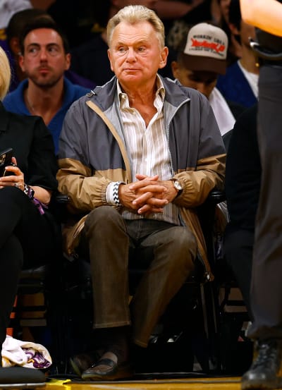Pat Sajak sits courtside for the game between the Golden State Warriors and the Los Angeles Lakers during the second half in game three of the Western Conference Semifinal Playoffs 