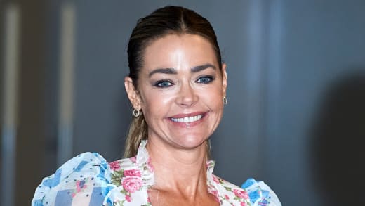 Actress Denise Richards attends "Glow & Darkness" photocall at the Palace Hotel 
