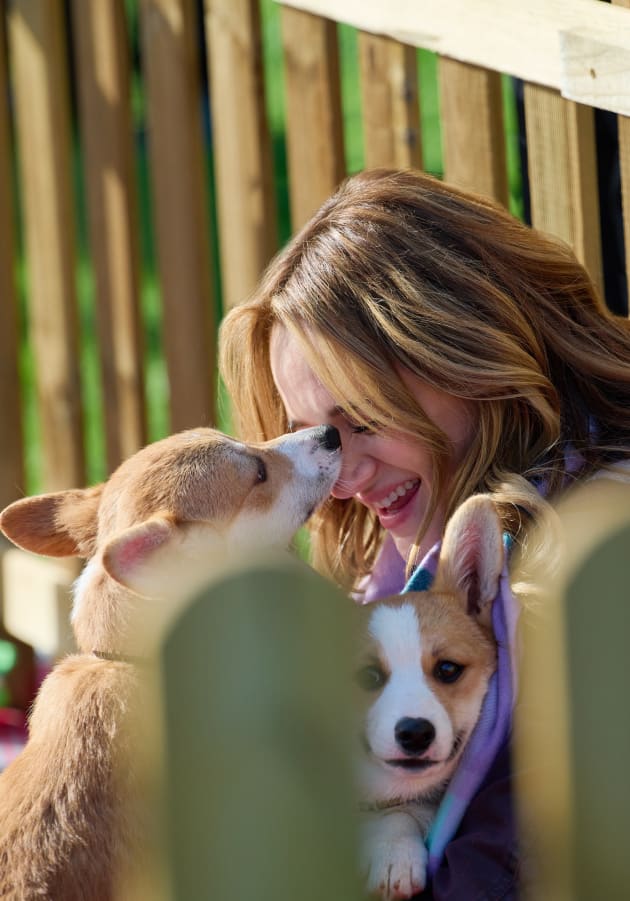 Cecily Snuggles with Pups