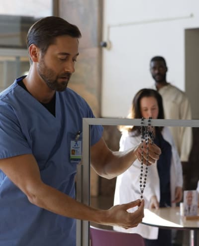 Max and Prayer Beads -tall - New Amsterdam Season 4 Episode 9